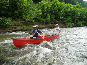 Dad decided he wanted to try it too, so Daniel dragged the canoe upstream again and they came back down!