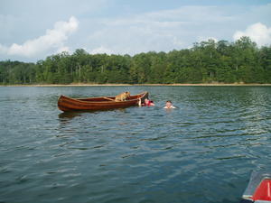 Poor Nellie--everyone in the water but her and she was floating away! We dumped the canoe twice on her, but she had lots of fun!