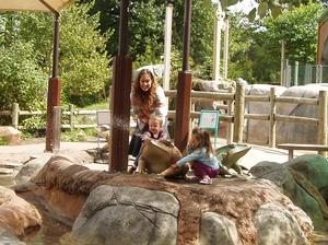 Sarah and the kids having fun with the froggie water fountains.