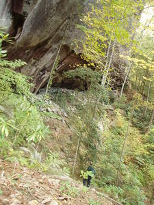 See Daniel down in the valley? That gives you an idea of how tall that rock wall is!