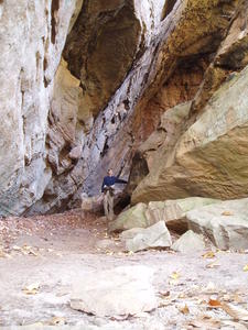 Daniel is standing inside the huge crack!