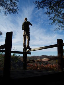 Erick on top of the fence for a better view.