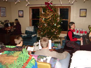 Singing Christmas Carols with organ/piano.