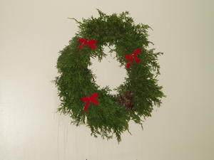 Kristina's second try at a wreath--made from cedar boughs from our trees. Worked better this time!
