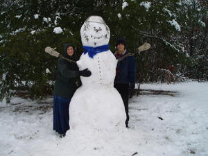 Daniel and Kristina with the snowman.