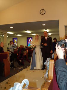 Here she comes with her Father (who was also the minister).