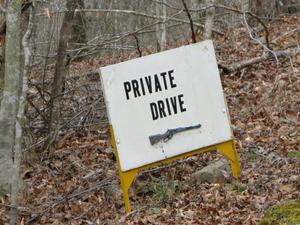 Our friends, Jason, Midori, Adam, and Pastor Sam asked if they could come caving with us. Eureka cave is only a few miles from us, and this was the sign at the beginning of the dirt road leading to the cave. So comforting!