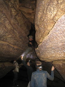 Pastor Sam climbing down after one of his explorations.