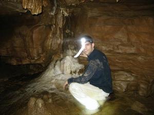 Jason examining a nice formation inside one of the passageways.