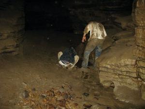 The guys washing off after playing in a big mud-slide!