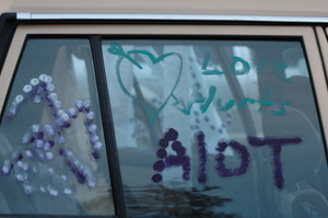 Written on one of the back windows.