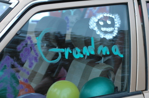 And Grandma got short hair! (Note the balloons filling the car seats!)