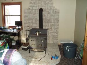 Our wood stove in the living room keeps the whole house warm in the winter time!