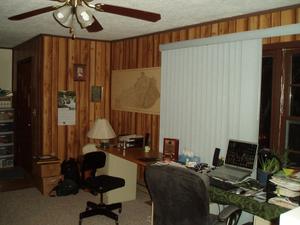 Here's a view of our office from the kitchen. The door on the far end goes to our second porch on the front side of the house.