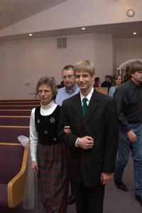 Daniel escorting his parents.