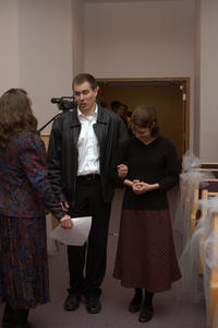 Groomsmen and Bridesmaids practicing their march. (Thankfully, they switched it for the wedding, so the girls held the guys arm instead!) Justina and Ben.