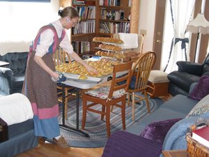 Multiple batches of raisin bread, whole wheat bread, spelt bread, and spelt raisin, eight large braided challah bread loaves, and 250 boulkas rolls! Here's just a few of them on the cooling racks. We had every table and counter FULL!