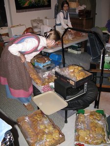 Bagging the piles and piles of bread and boxing it to store in a friend's freezer.