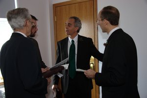 The four Pastors discussing their parts in the wedding. 