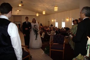 Daniel and Kristina slowly make their way up the steps to the platform, savoring every moment.