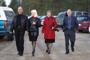 Kristina's Aunts and Uncles walking through the parking lot.