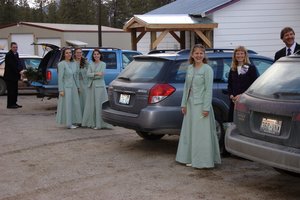 Wedding Party looks on in amazement as Daniel comes walking up carrying Kristina the WHOLE WAY!