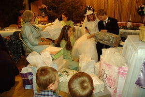 Opening gifts at the end of the reception.