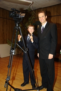 John, our head videographer, and his budding assistant, Landon.