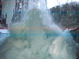Looking directly at the pile of ice under the falls--from behind the falls. (Unfortunately the camera glitched and put a couple streaks in the photo.) 