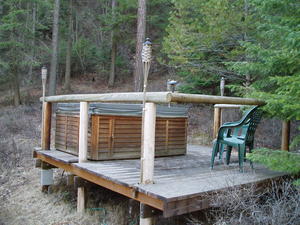 The hot tub in the woods.