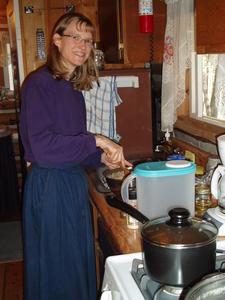 Kristina working in the kitchen (more like playing for her!)