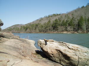 Sandstone rock along the shore.