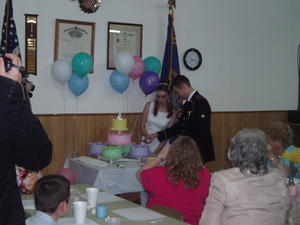 Cutting the cake.