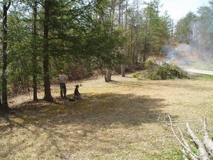 Daniel and Levi burning brush piles on our property (this one is in our front yard, from all the trees and brush we cut down last winter).