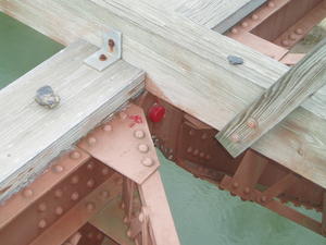 That little red pin holds the two halves of the bridge together!