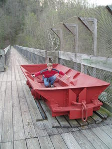 Levi sitting in the coal car.