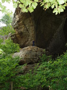 Levi made it to a ledge along the underside of the arch.