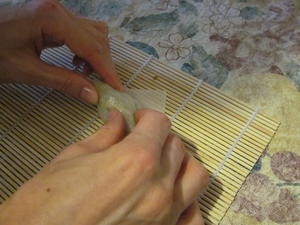Rolling up the spring roll.