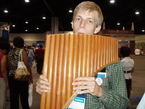 of Daniel trying out the Bolivian pipes!