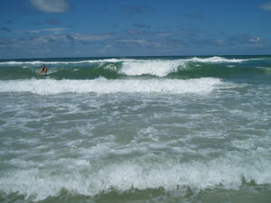 Swimming in the waves was lots of fun too... here's Lucas trying it out. :)