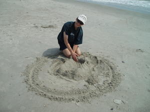 Daniel building a sand castle