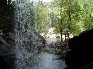 Looking out from behind Eagle Falls. It was a warm day, so the spray felt good!