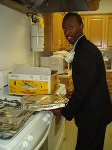 Groomsmen helped to carry lasagne into the reception hall minutes before the wedding!