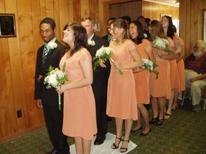 Bridesmaids and Groomsmen all lined up to march in.