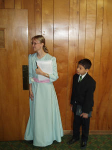 Kristina and the Bible boy waiting for them to go in.