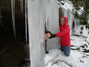 Daniel hugging a HUGE icicle, David peeking from jail bars.