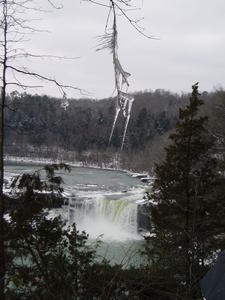 Unique view of icicles with Cumberland Falls in the background.