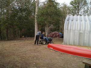 The owner finally came and got his old boat, so Daniel and David decided to smooth out the ground. They didn't have a box scraper, so they invented one.....