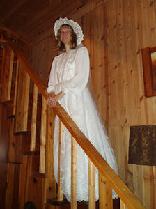 Kristina on the stairs to the attic.