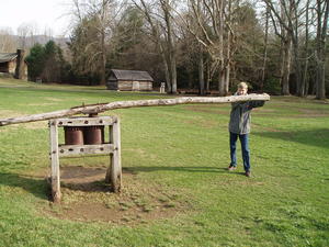 Hand-crank (or Donkey pulled) juicer for the sorghum stalks.